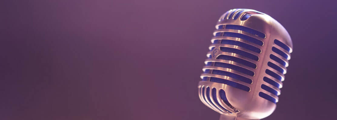 The banner image with the microphone