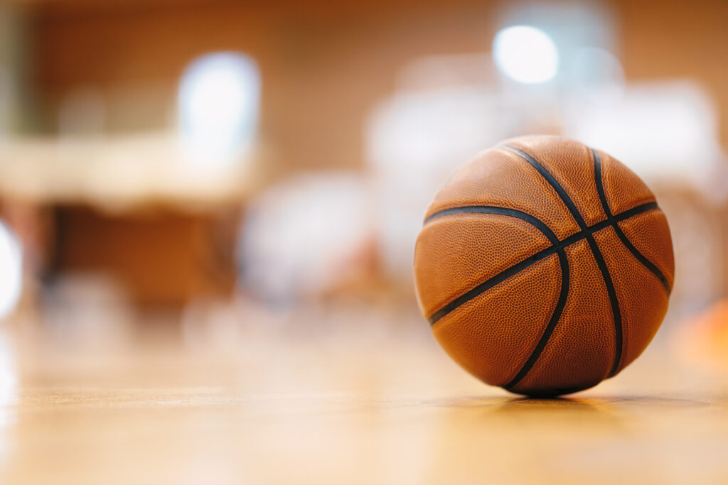 Close-up image of basketball in the gym.