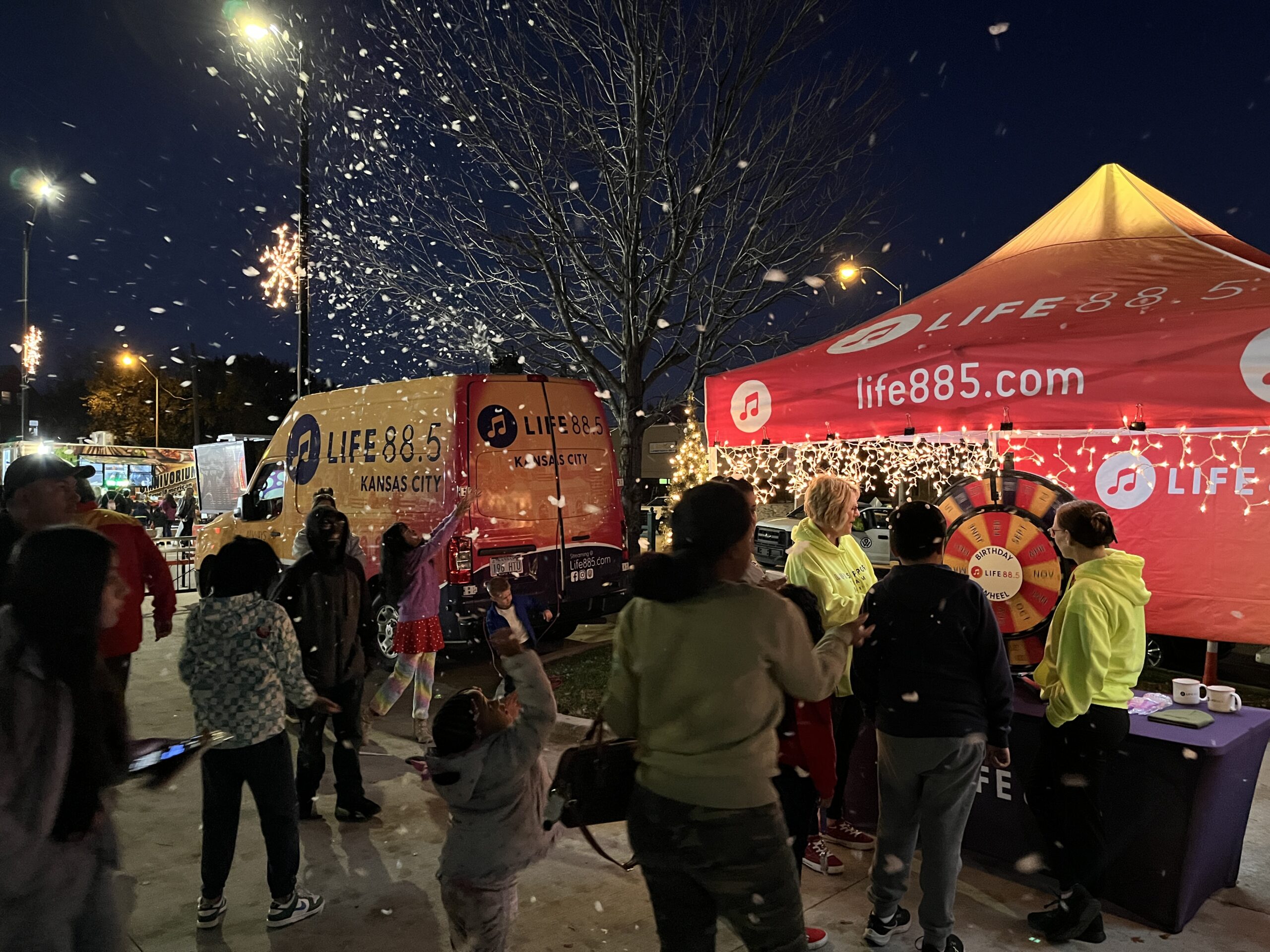 Image of people standing outside at a Life 88.5 event
